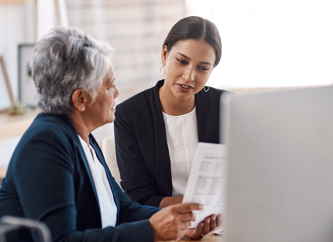 UK insurance agent assisting client with policy review